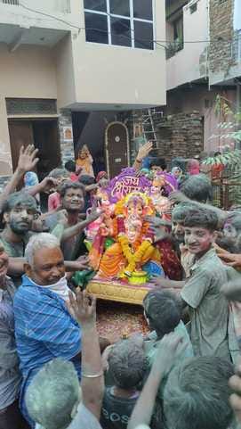 The idol was immersed in a water tank, devotees celebrated the festival