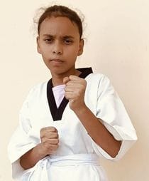 Student won gold medal in divisional level Taekwondo competition
