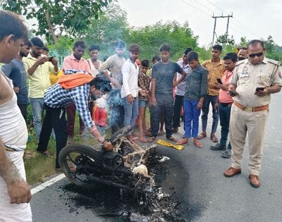 Bike collided with car and caught fire, one died