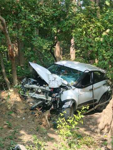 The car lost control and hit a tree on the side of the road