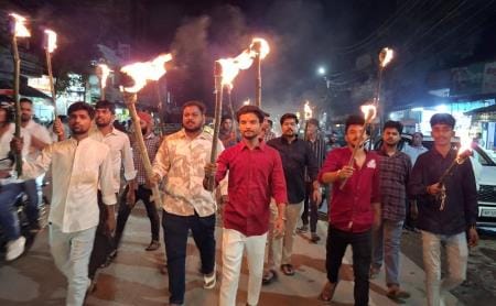 Protest held by taking out torchlight procession