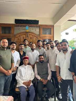 BJYM state president Sunny Shukla took blessings from Dhumal
