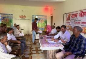 Workers keeping distance from village Chaupal, villagers are angry