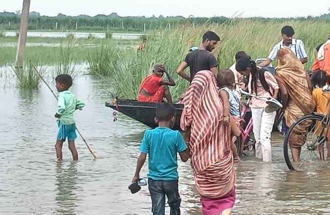 Rising water levels have cut off seven villages from access to the embankment