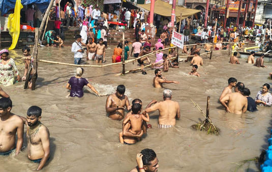 On the full moon day, devotees took a holy dip in the river Ganga