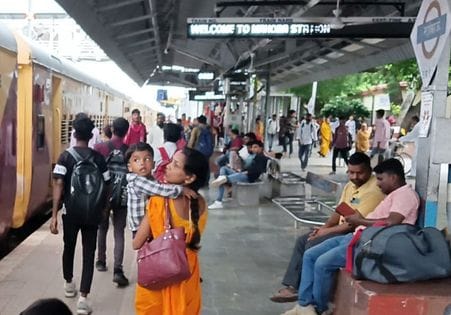 Crowd of PET candidates gathered in buses and trains