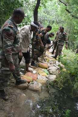Army engaged in strengthening the banks of Mungeshpur drain