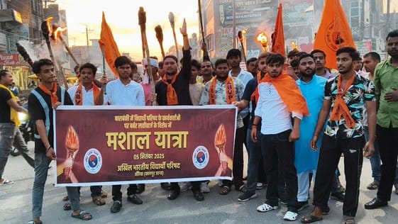 ABVP workers protested during torchlight procession