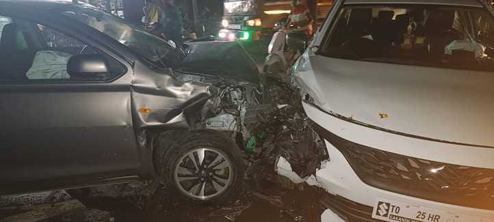 Two people injured in collision between two cars and a bike
