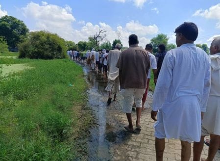 The road to the crematorium in Indal Khurd is closed, the bodies are being carried in tractor-trolleys