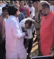 The villager touched the minister's feet and folded his hands and said, please save the embankment