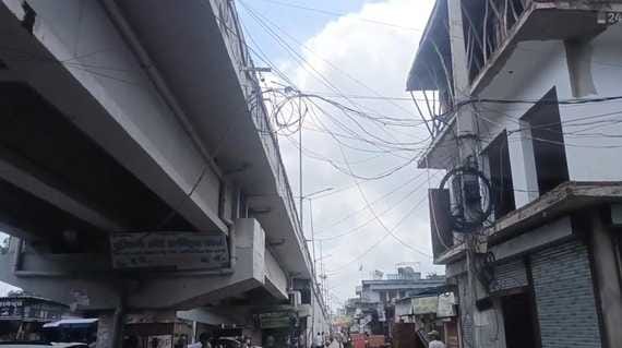 The construction of the flyover is progressing at a slow pace, causing daily traffic jams