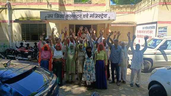 Villagers troubled by dirt and dilapidated roads staged a protest