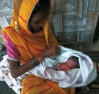 A woman gave birth to a child in a flood shelter, named him Bahadur
