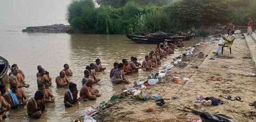 People gathered on the banks of Ganga to offer prayers to their ancestors