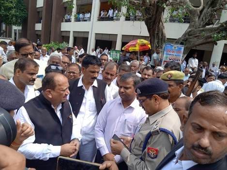 Lawyers blocked traffic at the Collectorate square in protest against the arrest of their colleague