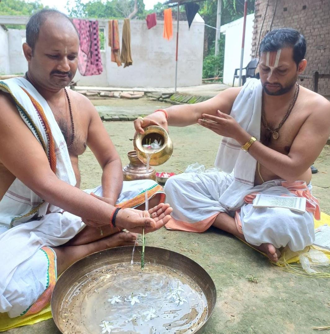 Paying homage to ancestors by offering Pinddaan