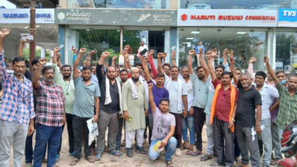 Auto drivers surrounded the showroom accusing them of overcharging