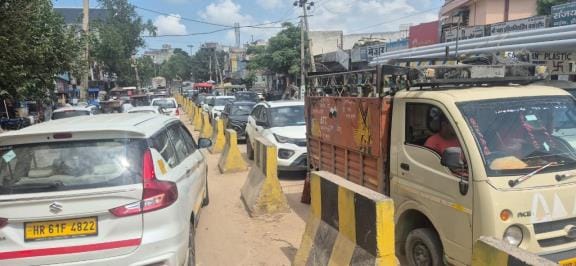 After demolishing the illegal construction, the officers forgot to prepare the service road, the construction work of Loharu Road bridge is going on at a snail's pace