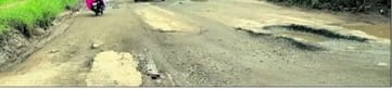 Potholes on Meerut-Garh highway have become a problem for pedestrians