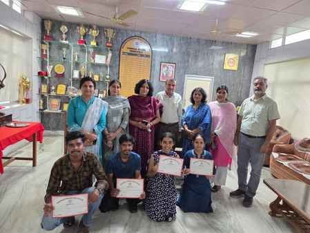 Sanmeet Kaur stood first and Raja stood second in the proposal writing competition