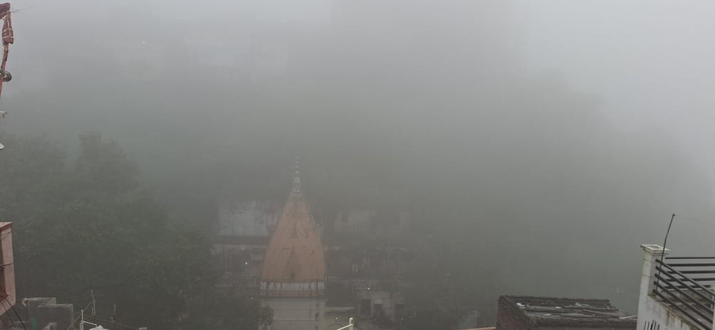 The city is engulfed in morning fog