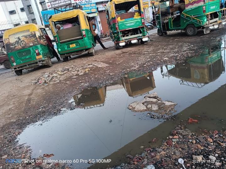 Waterlogging under the overbridge, people wandering for parking