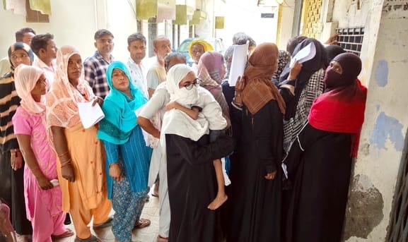 People are wandering around the supply department after their ration cards are cancelled