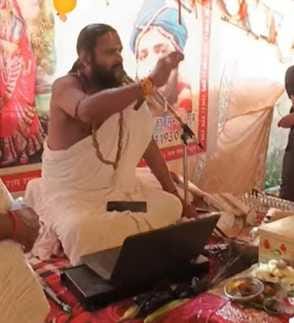 The narrator hid his identity and made the Brahmin community touch his feet