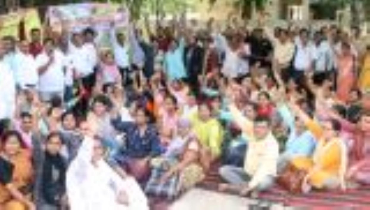 Teachers angry with the implementation of TET staged a sit-in protest