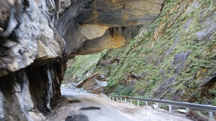 Boulders are peeking out like death, life is hanging in the abyss