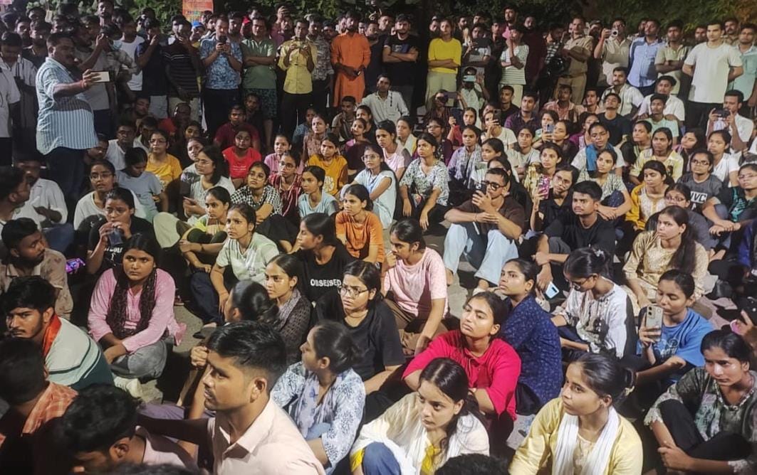 Students demanding resignation of the principal surrounded the DM residence