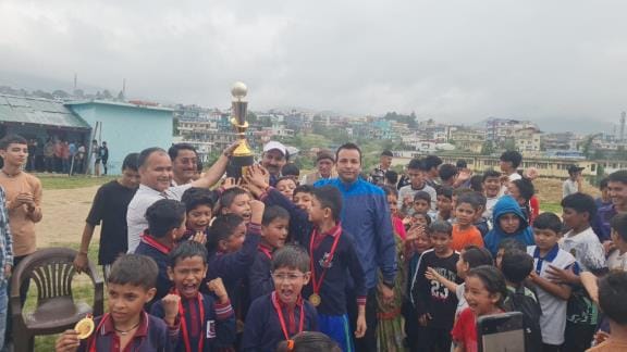 Angeles won the Under-10 football trophy