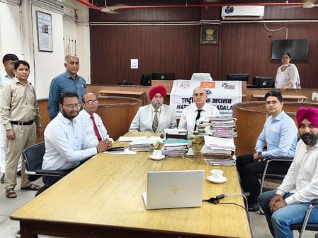8745 cases settled in National Lok Adalat