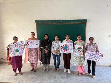 Harmandeep first in Muskaan poster making and slogan writing