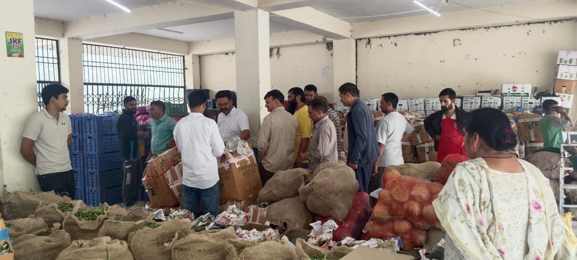 Hope rises from the rubble... the vegetable market is back in business