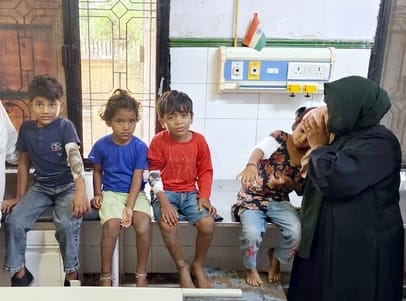 Four children were bitten by dogs while playing outside their homes