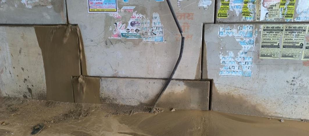 Rain water started flowing from the wall of the flyover