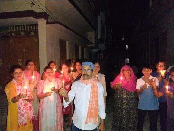 Candle march taken out in protest against faulty street lights