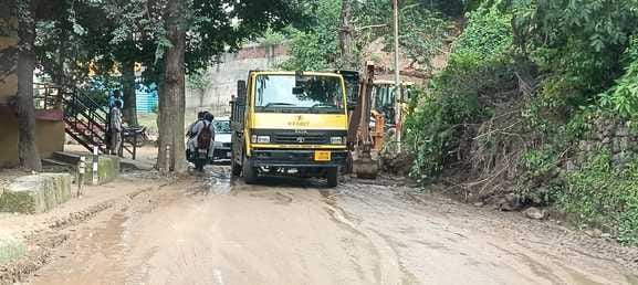 Repair work begins on the Trilokpur-Kala Amb road damaged by rain.