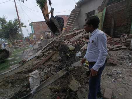 Encroachment obstructing the widening of the state highway was removed