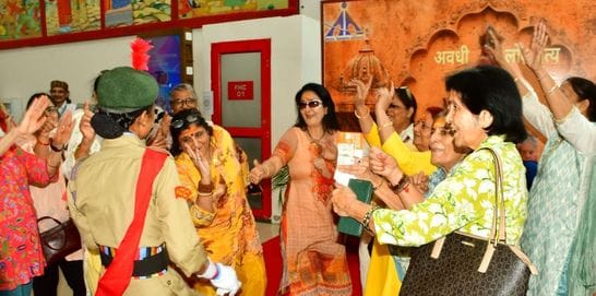 Passengers are welcomed with Tilak at the airport