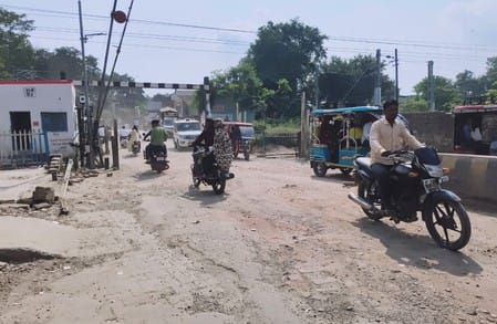 Road construction stalled at railway crossing in Chandausi, people upset