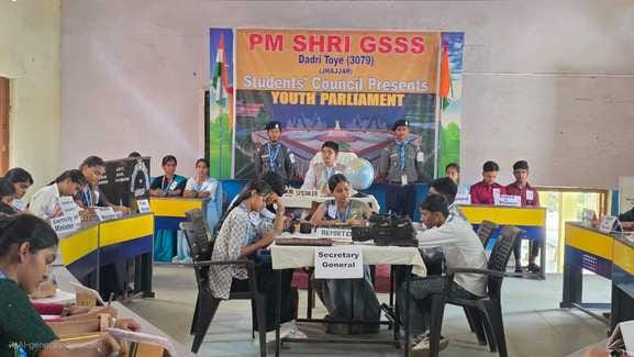 Students played the role of ruling party and opposition in the Youth Parliament