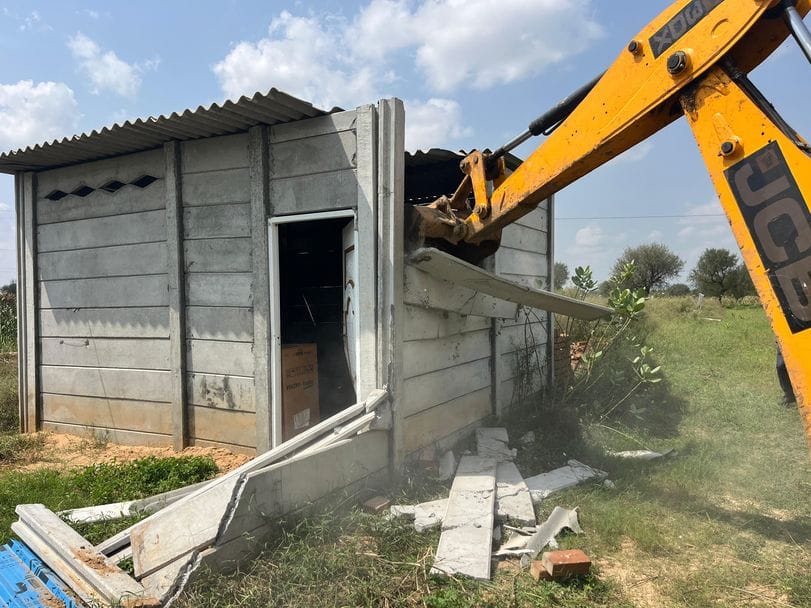 Illegal occupation removed from an illegal colony being built on two acres of land.