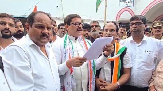 File a case against the Minister of State