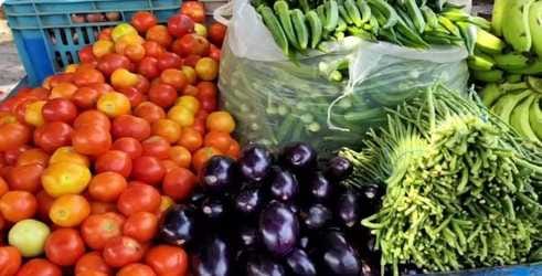 Record-breaking rains have increased vegetable prices.