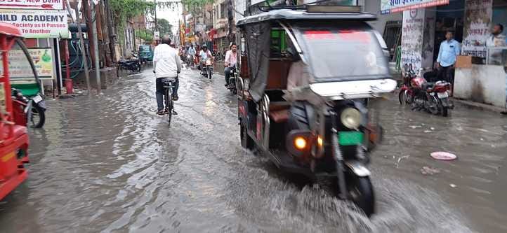 Rain flooded roads, temperature dropped by one degree