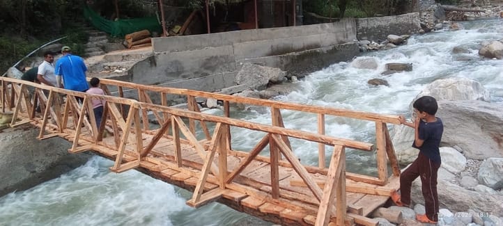 The bridge broke, but not the courage.. With high spirits, we built the bridge of hope.