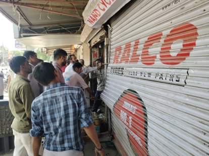 A punctured air filling tank at the bicycle shop outside the municipal council office.